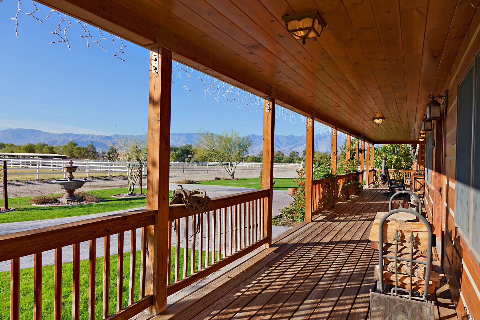 Ranch porch overlooking horse stables